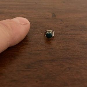 Single dark blue stud